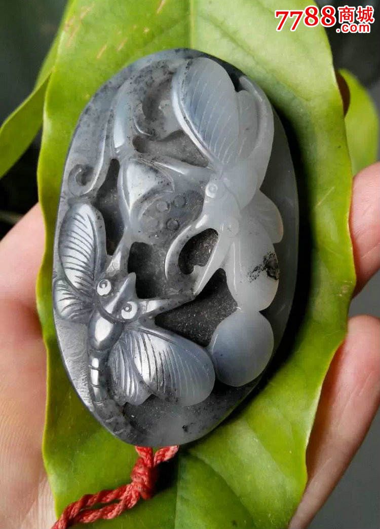 新疆和田青花玉手把件蜻蜓